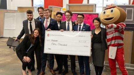Full group of Holocron with Grace Wang and Brutus with check at Pitch Finale.