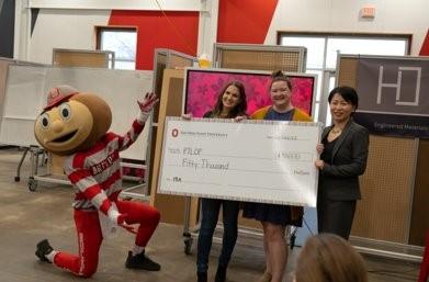 For the Love of Primates at pitch finale with check, Brutus and Grace Wang